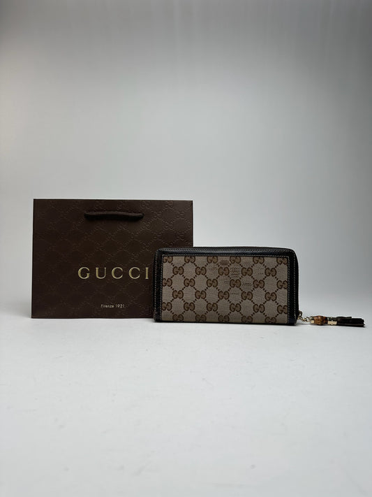 Portefeuille vintage en cuir monogramme Gucci beige marron