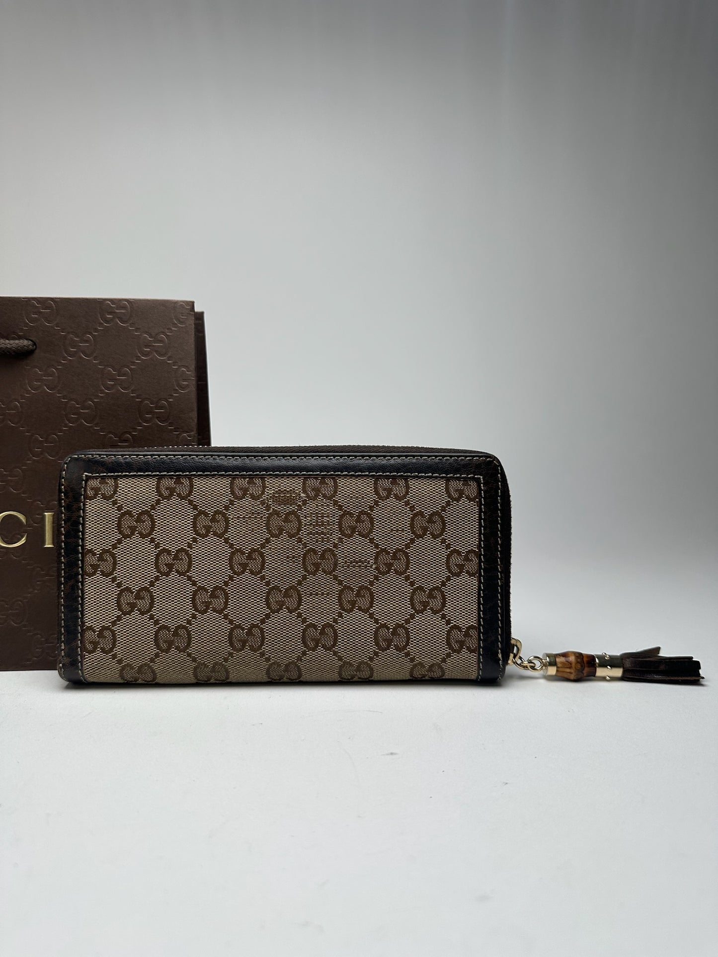Portefeuille vintage en cuir monogramme Gucci beige marron