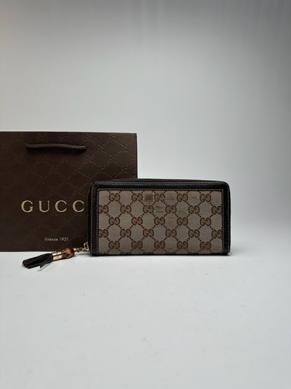 Portefeuille vintage en cuir monogramme Gucci beige marron