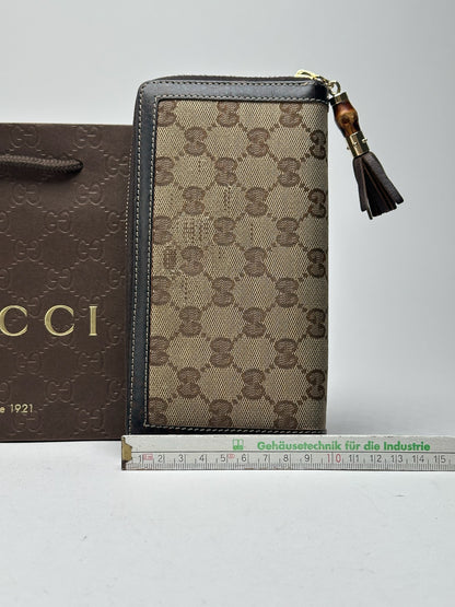 Portefeuille vintage en cuir monogramme Gucci beige marron