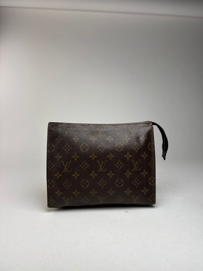 Vintage Louis Vuitton Monogram leather clutch brown