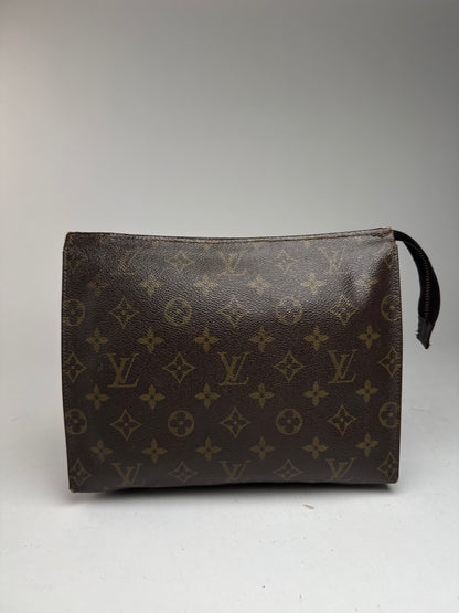 Vintage Louis Vuitton Monogram leather clutch brown