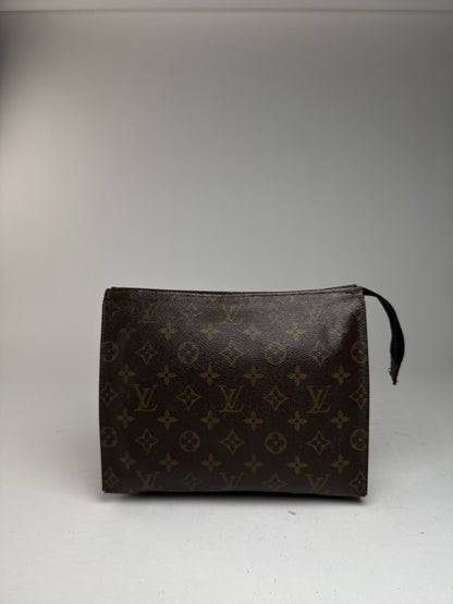 Vintage Louis Vuitton Monogram leather clutch brown