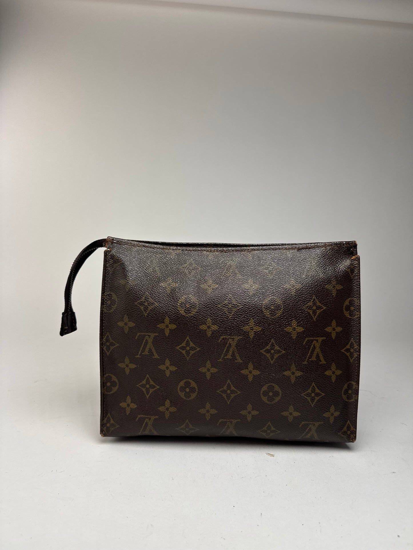 Vintage Louis Vuitton Monogram leather clutch brown