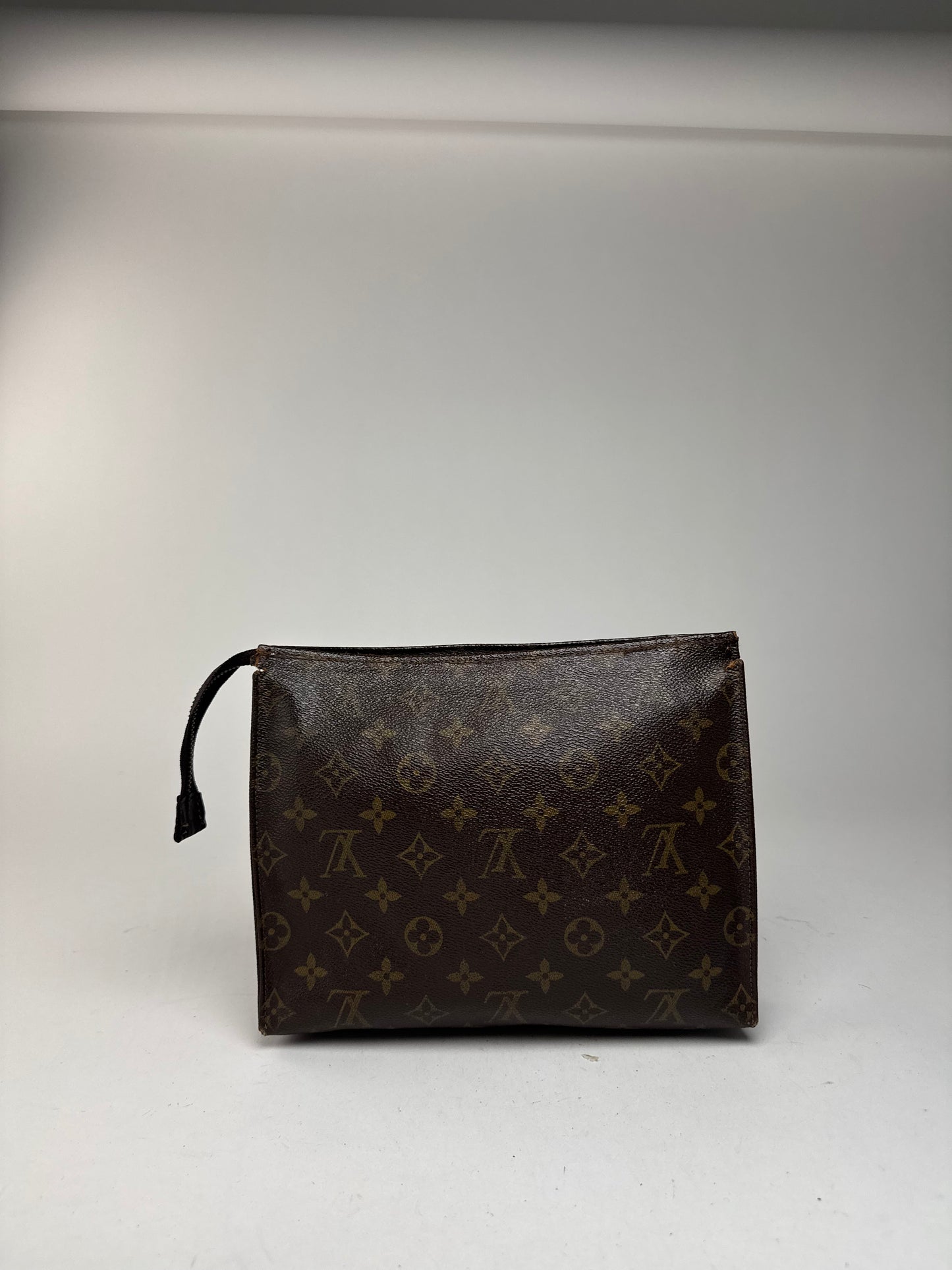 Vintage Louis Vuitton Monogram leather clutch brown