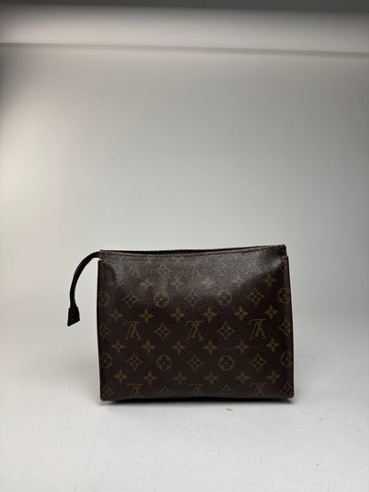 Vintage Louis Vuitton Monogram leather clutch brown