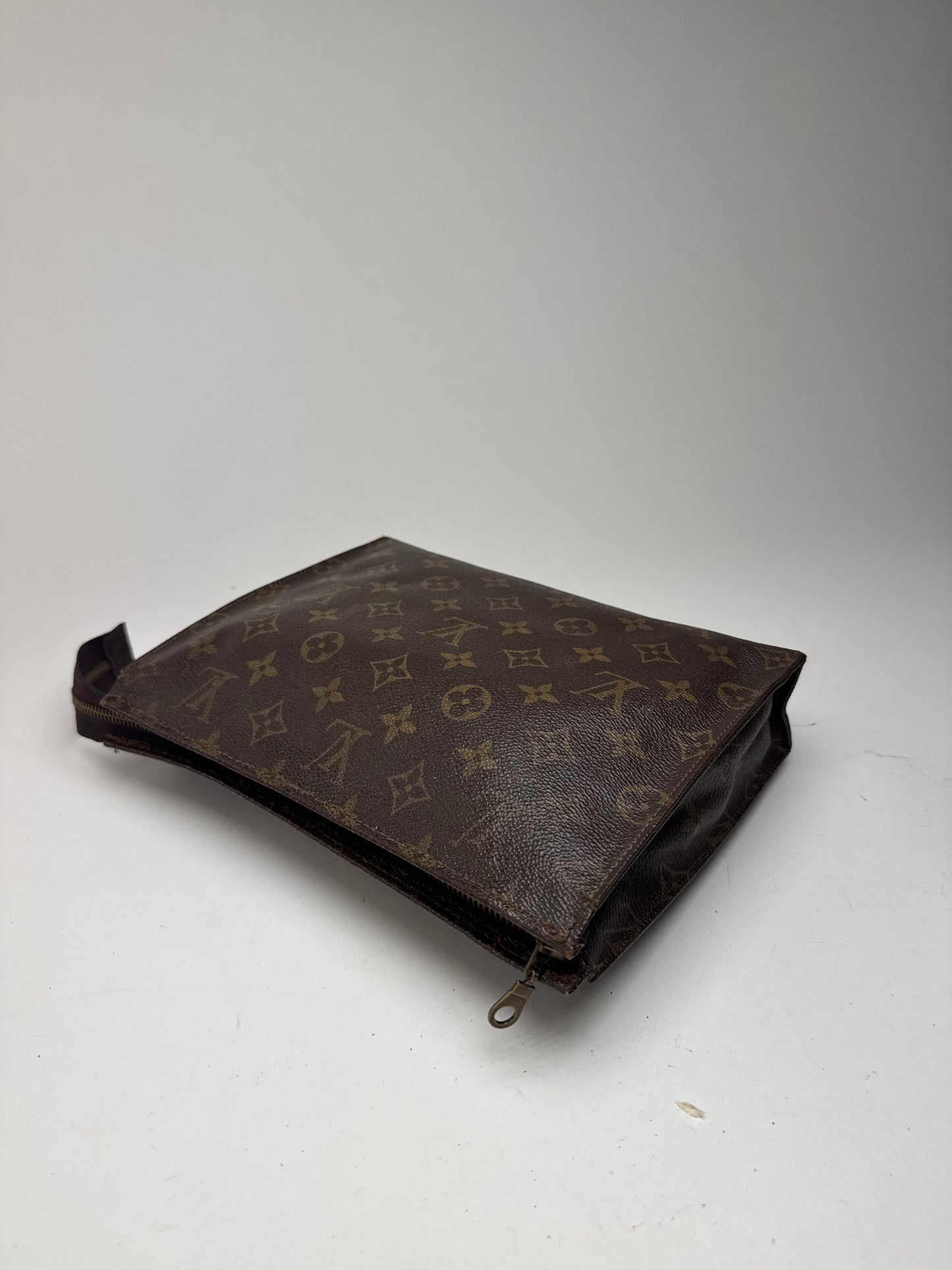 Vintage Louis Vuitton Monogram leather clutch brown