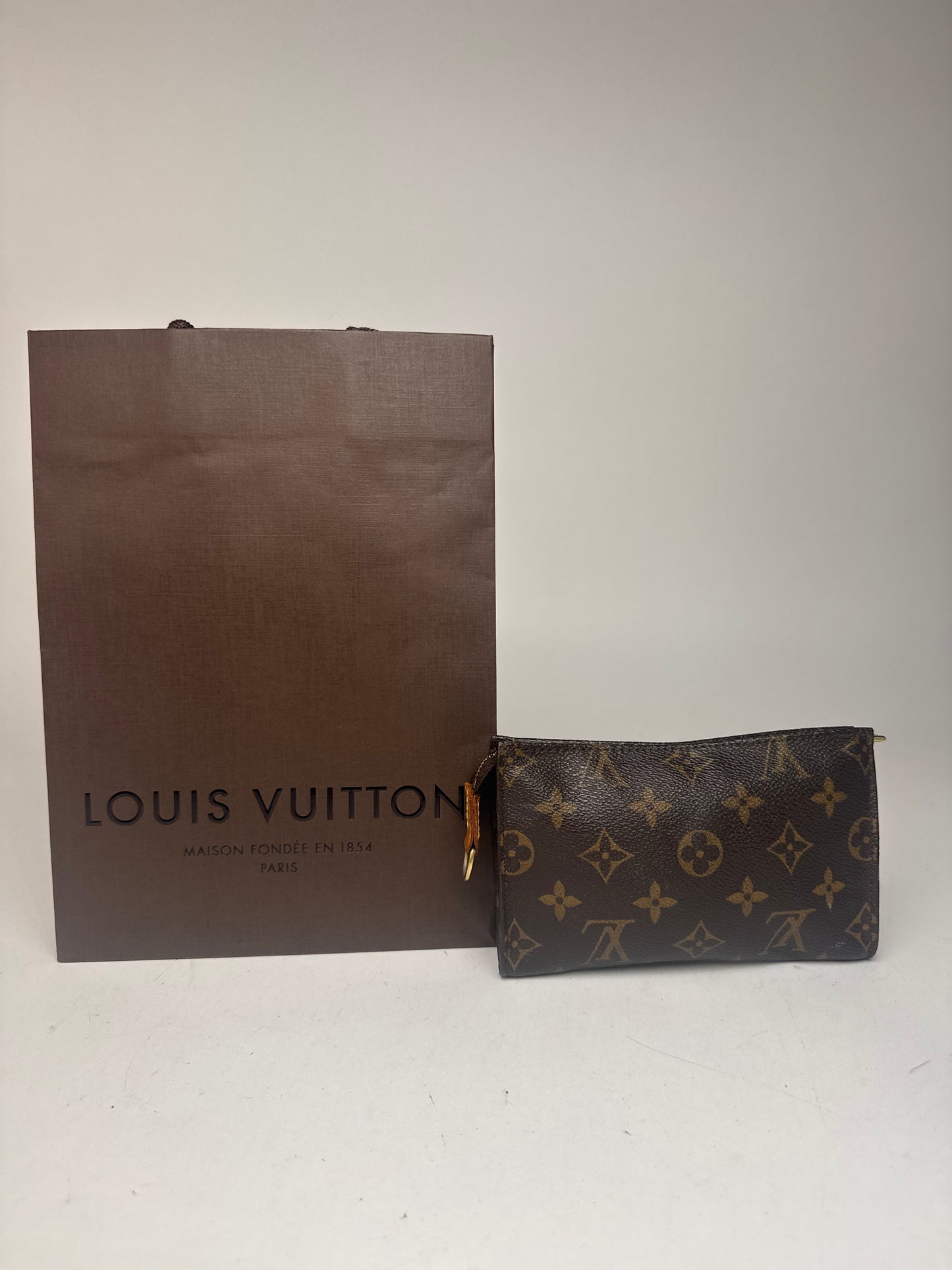 Pochette vintage Louis Vuitton en cuir Monogram marron