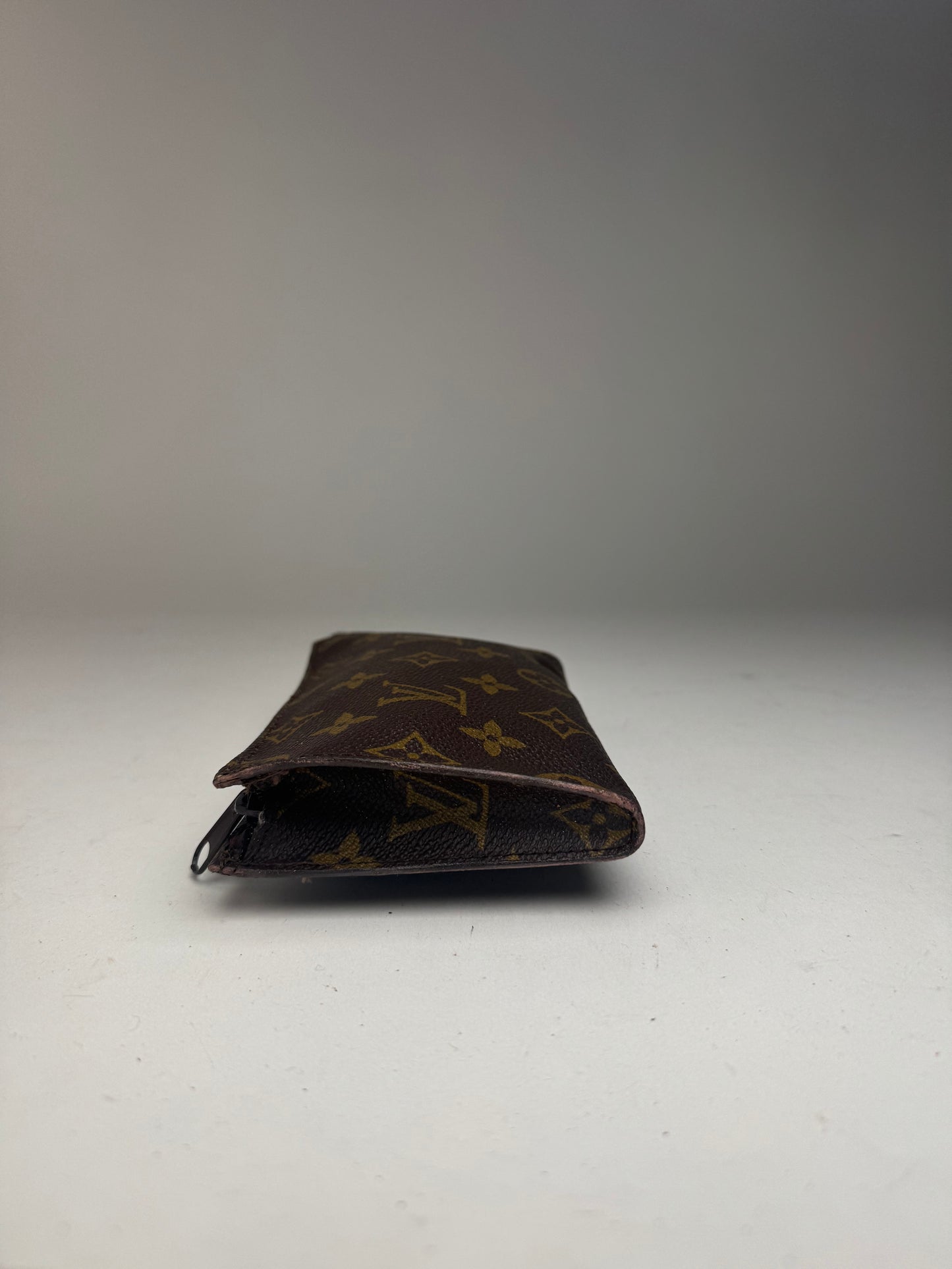 Pochette en cuir monogramme Louis Vuitton vintage