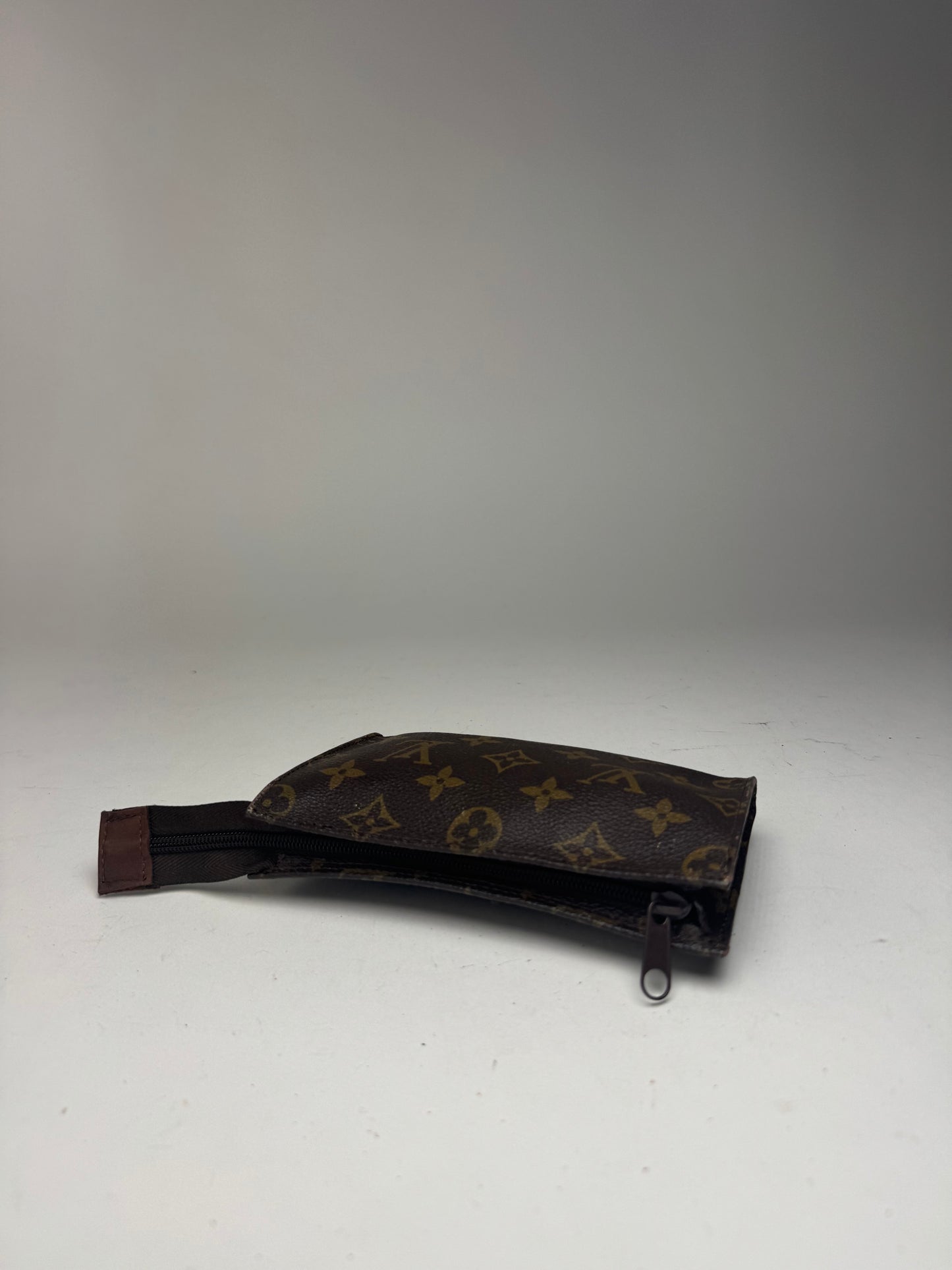 Pochette en cuir monogramme Louis Vuitton vintage