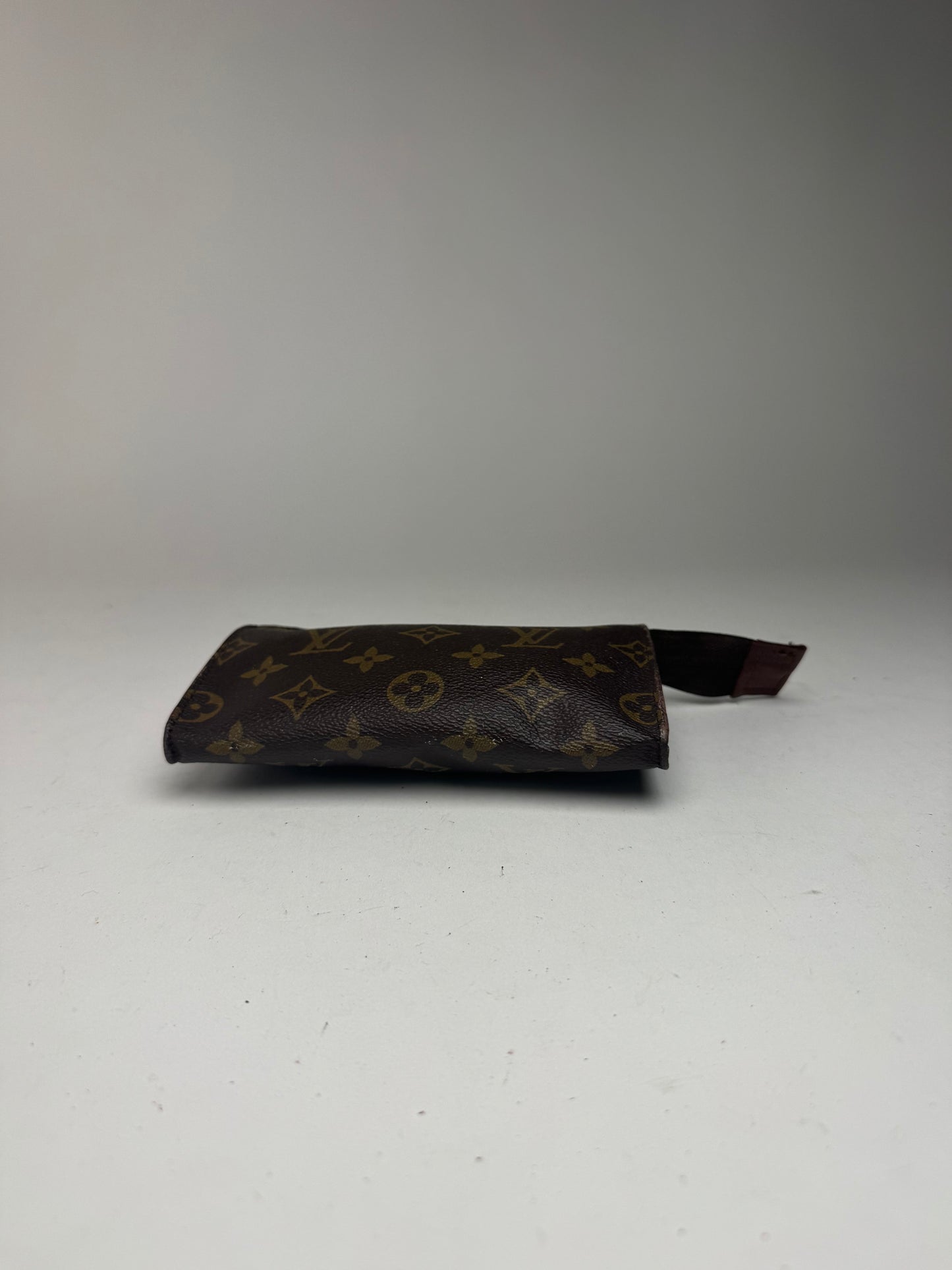 Pochette en cuir monogramme Louis Vuitton vintage