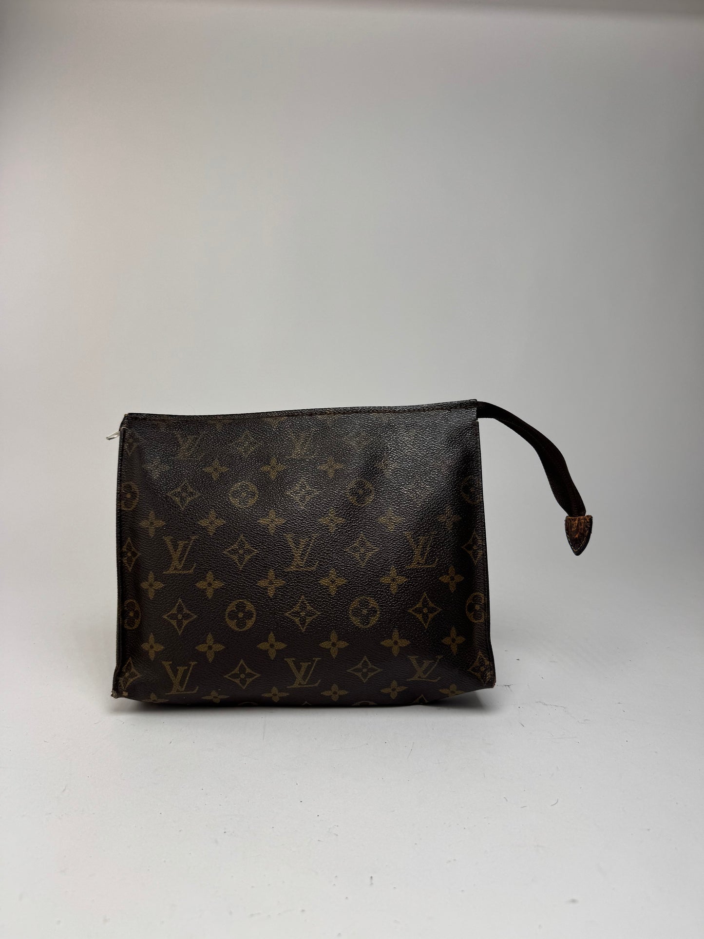 Vintage Louis Vuitton monogram leather clutch brown