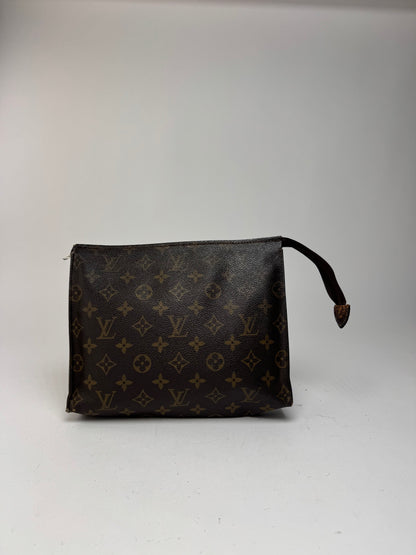 Vintage Louis Vuitton monogram leather clutch brown