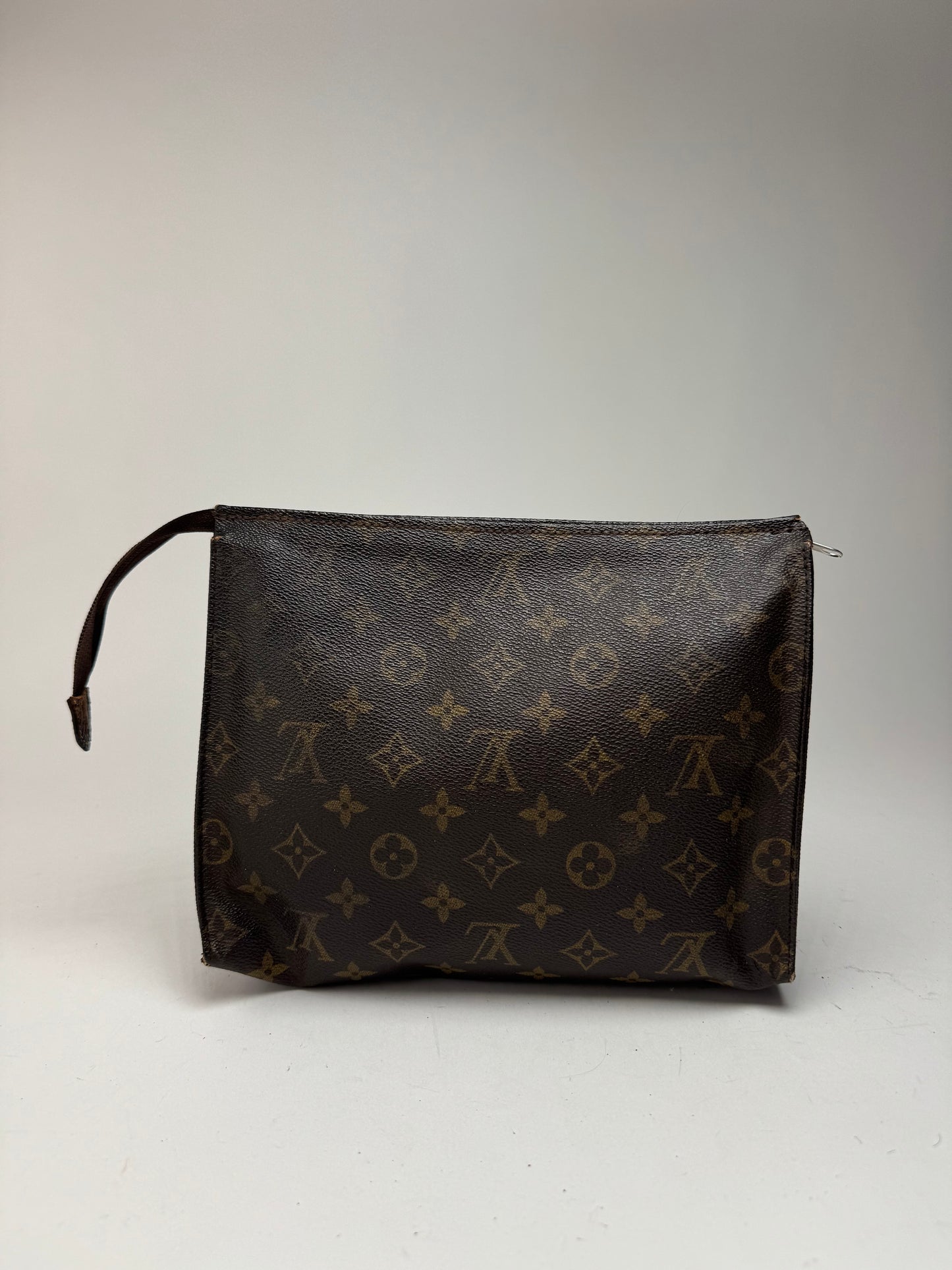 Vintage Louis Vuitton monogram leather clutch brown