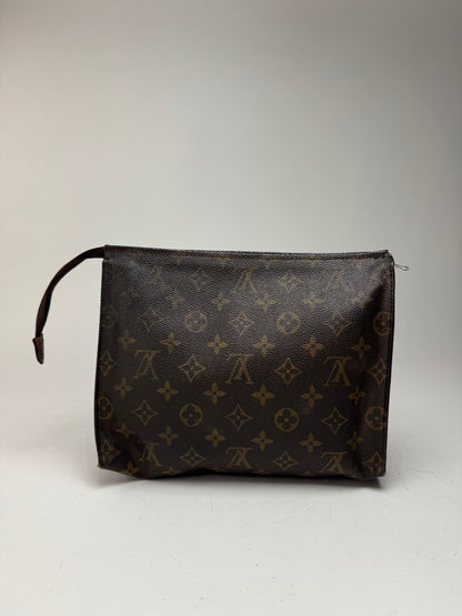 Vintage Louis Vuitton monogram leather clutch brown