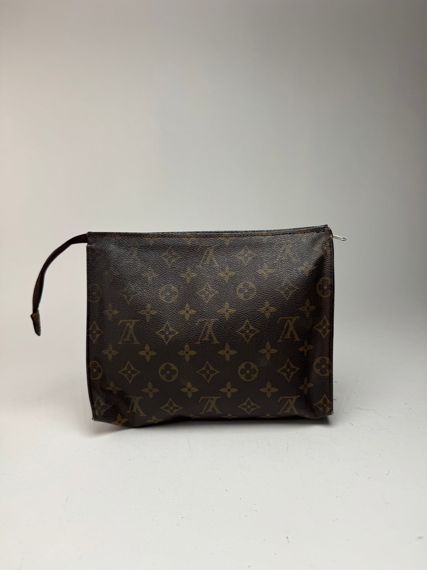 Vintage Louis Vuitton monogram leather clutch brown