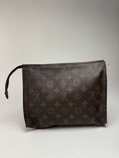 Vintage Louis Vuitton monogram leather clutch brown