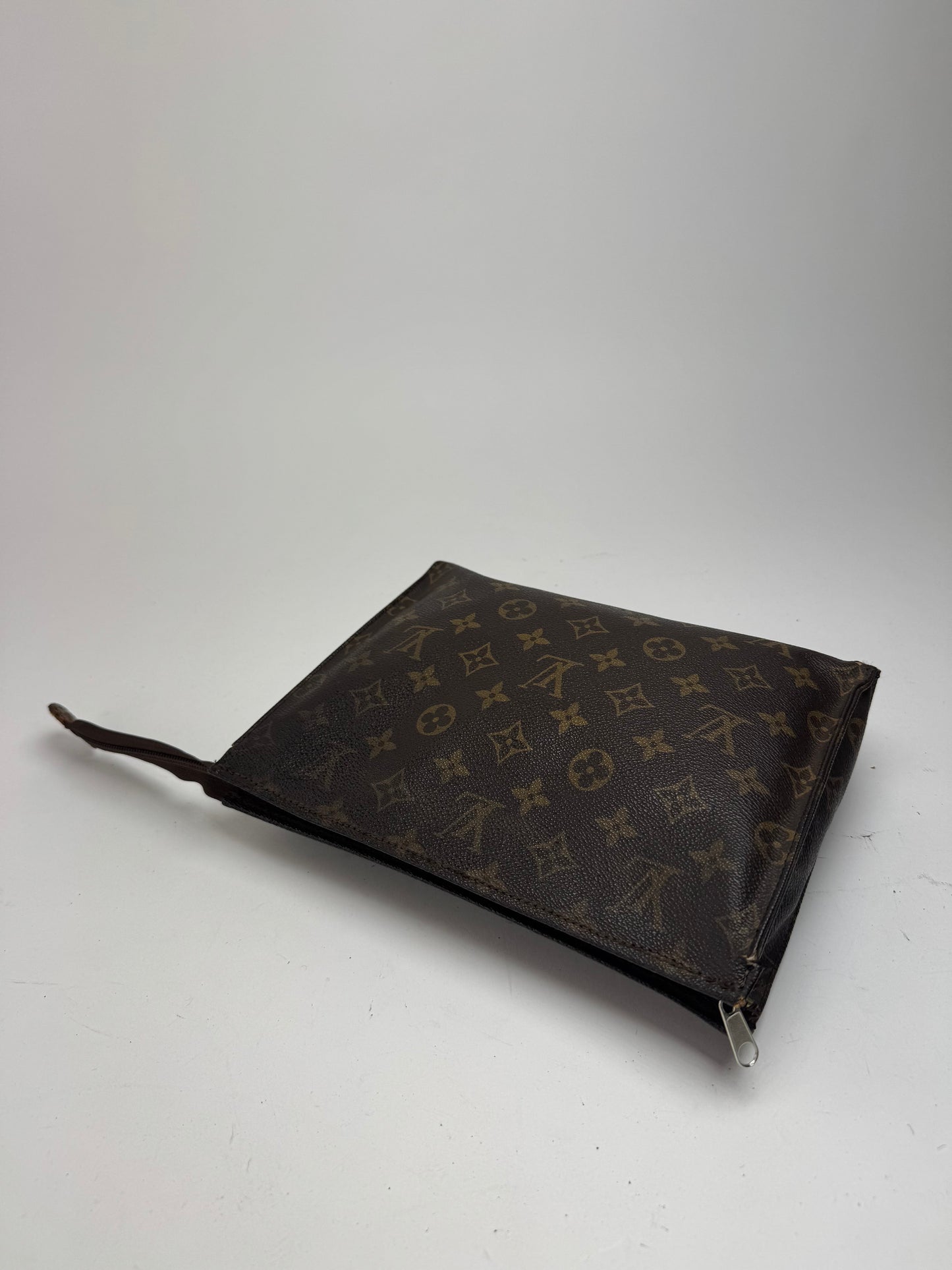 Vintage Louis Vuitton monogram leather clutch brown