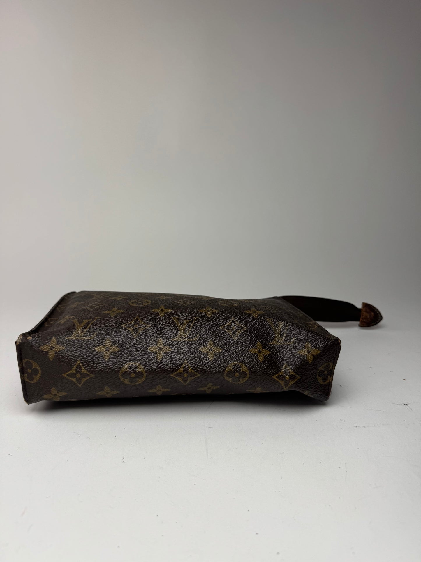 Vintage Louis Vuitton monogram leather clutch brown
