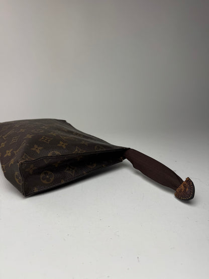 Vintage Louis Vuitton monogram leather clutch brown