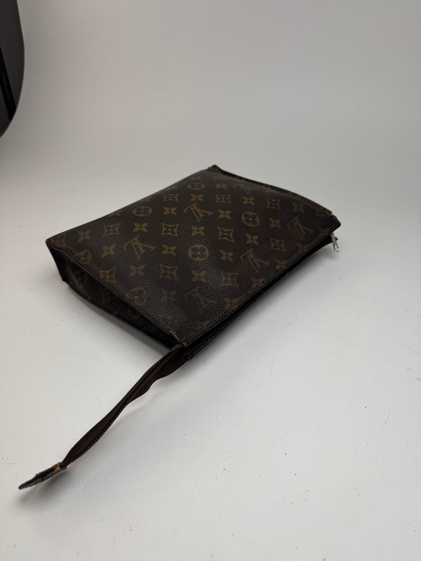 Vintage Louis Vuitton monogram leather clutch brown