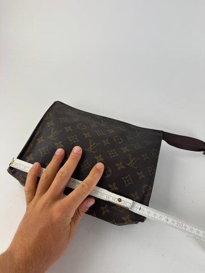 Vintage Louis Vuitton monogram leather clutch brown