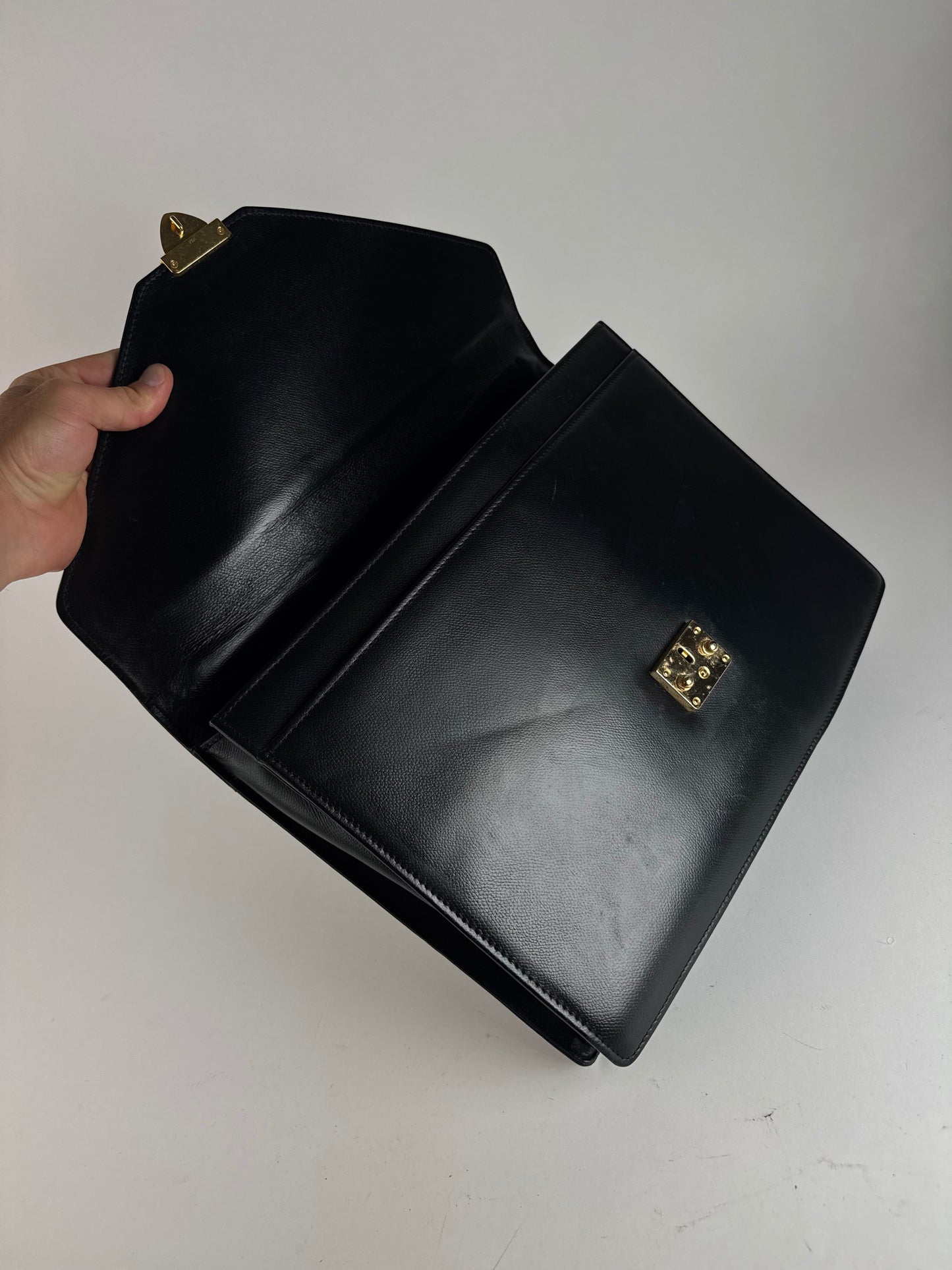 Serviette vintage en cuir noir Yves Saint Laurent