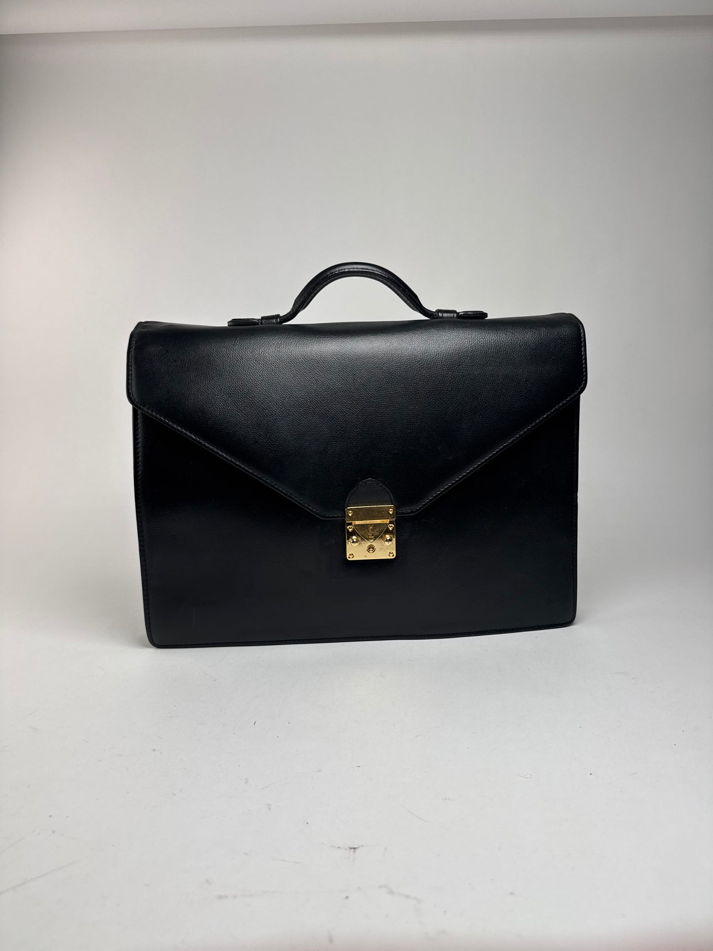 Serviette vintage en cuir noir Yves Saint Laurent