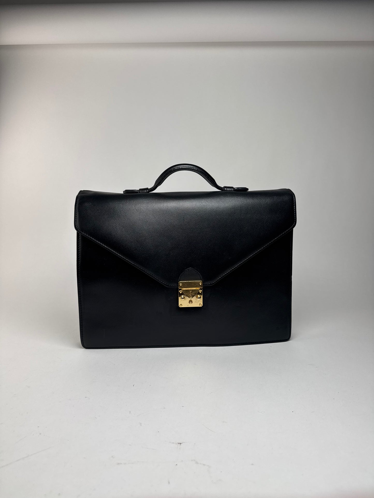 Serviette vintage en cuir noir Yves Saint Laurent
