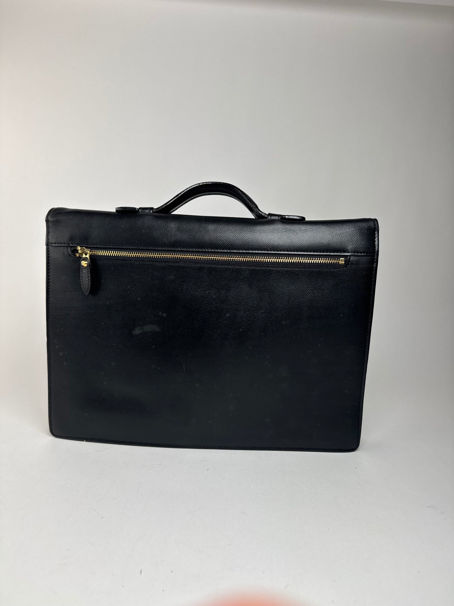 Serviette vintage en cuir noir Yves Saint Laurent