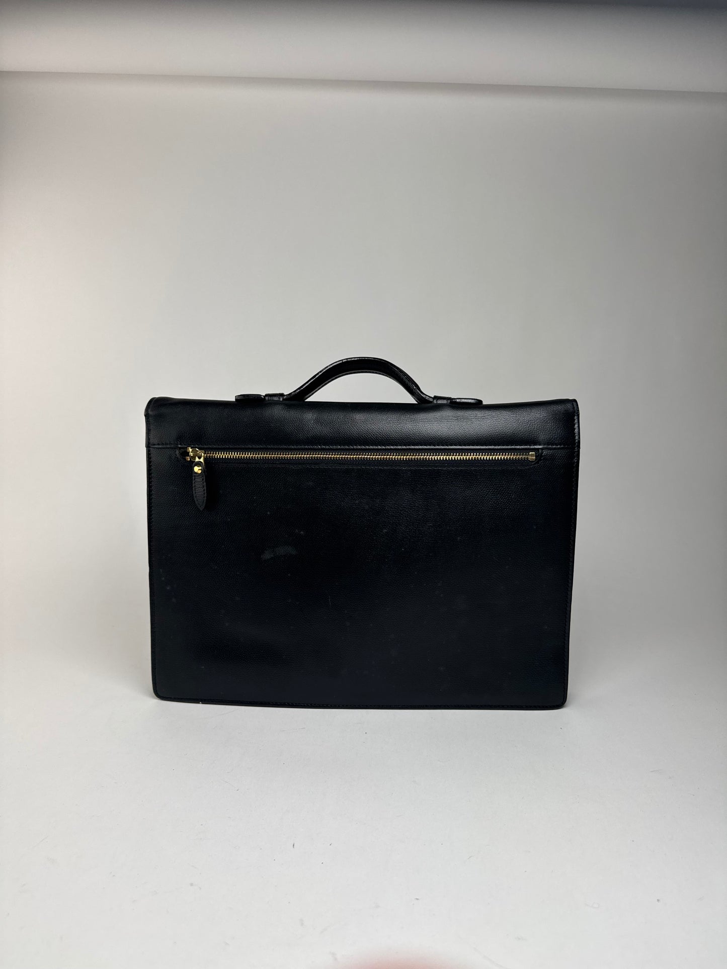 Serviette vintage en cuir noir Yves Saint Laurent