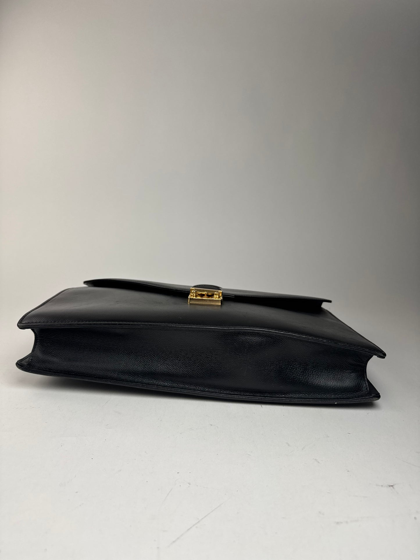 Serviette vintage en cuir noir Yves Saint Laurent