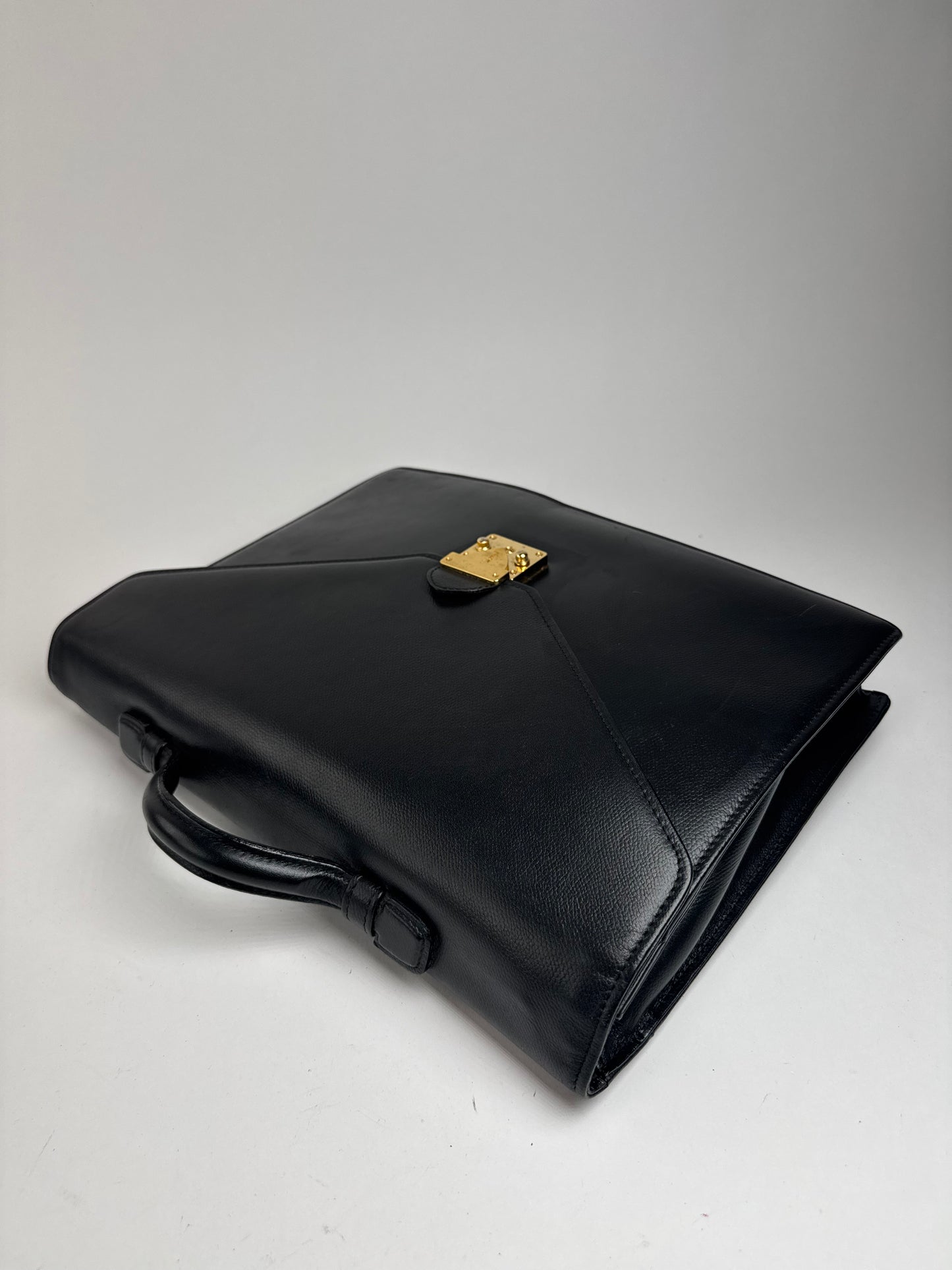Serviette vintage en cuir noir Yves Saint Laurent