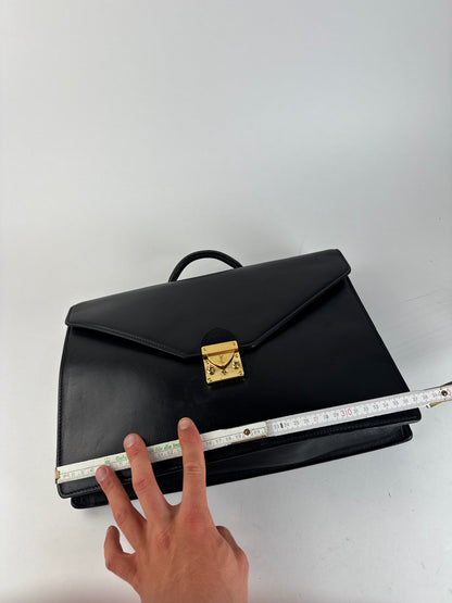 Serviette vintage en cuir noir Yves Saint Laurent
